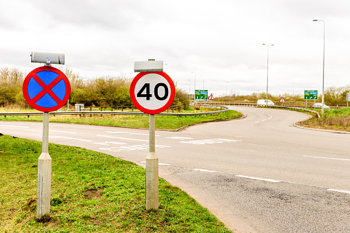 Day view background of UK Motorway Road 40 Speed Limit.