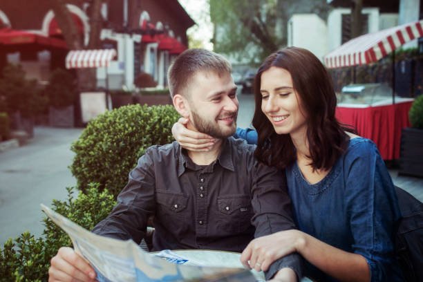 istock Couple searching in the map 671415436