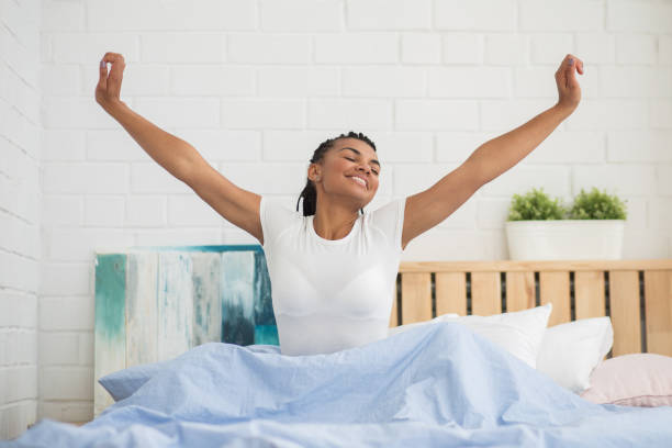 istock Cheerful woman enjoying new day 671418208