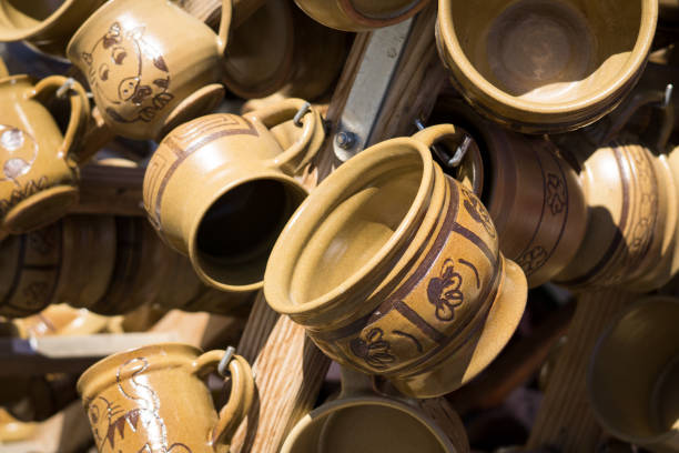 istock Earthen cups on a market 671426128