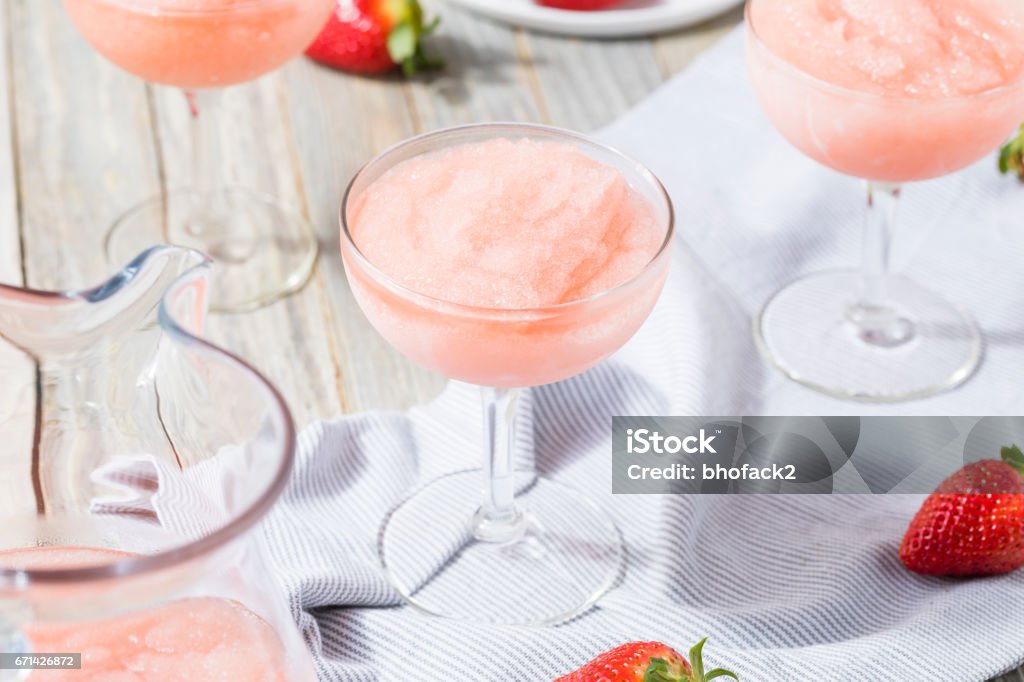 Cold Refreshing Frozen Rosé Wine Cocktail Cold Refreshing Frozen Frosé Rosé Wine Cocktail in the Summer Rosé Wine Stock Photo