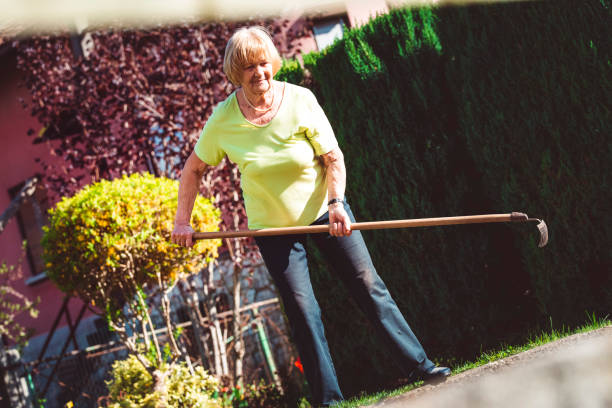 istock Senior woman gardening 671429434