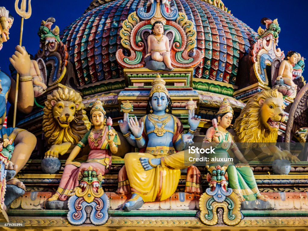 Hindu Gods decoration in Sri Mariamman Temple Singapore Hindu Gods sculptures in the roof of the  Sri Mariamman Temple in Chinatown Singapore Hinduism Stock Photo