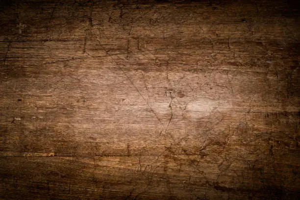 Old wooden plate as background