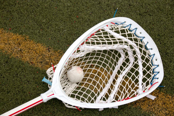 istock Lacrosse gaolie stick with a ball 671431702