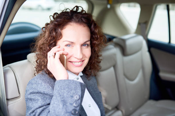 istock Successful business lady in car 671434358