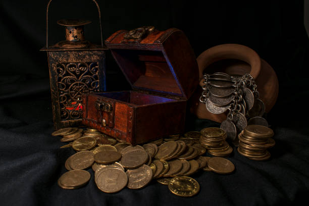 istock Treasure chest and coins 671437414