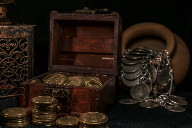 istock Treasure chest and coins 671452058
