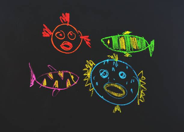 istock Fishes in the sea.We draw chalk on a board. 671455730