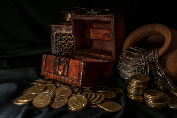 istock Treasure chest and coins 671458244
