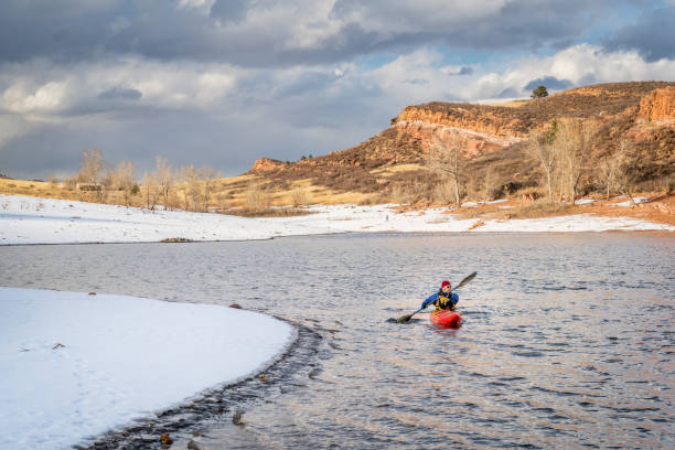 istock winter kayaking in northern Colorado 671458290