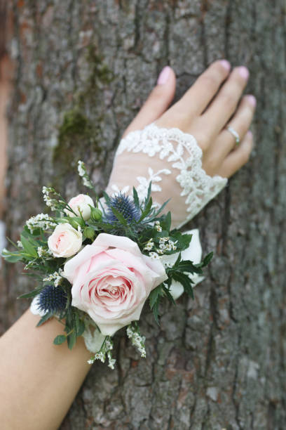 istock Pale pink, blue and green wrist corsage 671459188