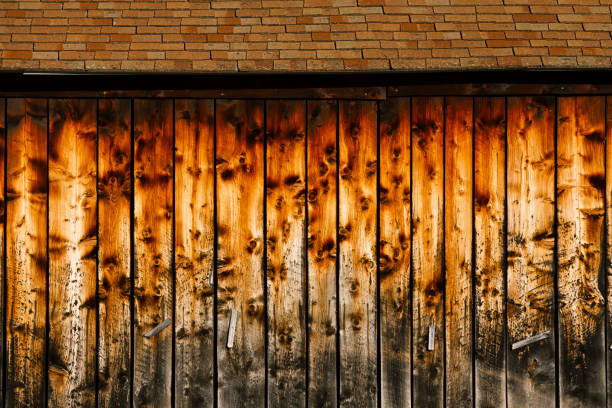 Old weathered barn on a farmland.