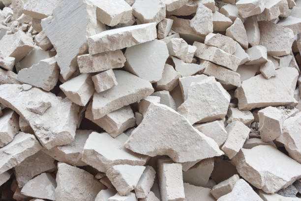 istock A pile of stones. Unusual background from broken gray bricks 671462182