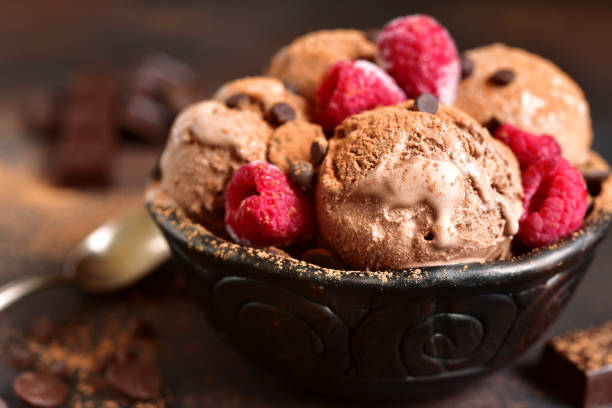 istock Homemade chocolate ice cream with raspberry and chocolate chips. 671472776