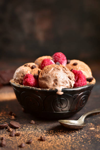 istock Homemade chocolate ice cream with raspberry and chocolate chips. 671472794
