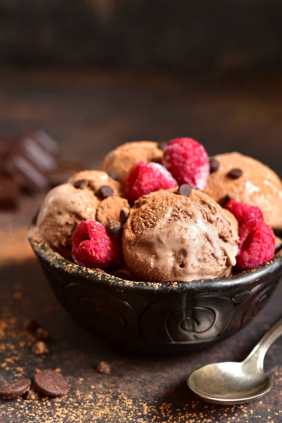 istock Homemade chocolate ice cream with raspberry and chocolate chips. 671472800