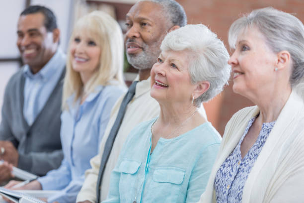 istock Retired seniors attend class at senior center 671472874