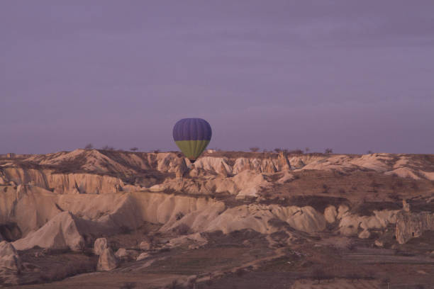 istock Strange stone formations, Cappadocia, Turkey. People during journey to Cappadocia 671482300