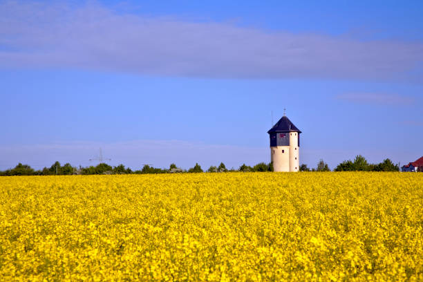 istock water tower in beautiful landscape with blue sky 671484838