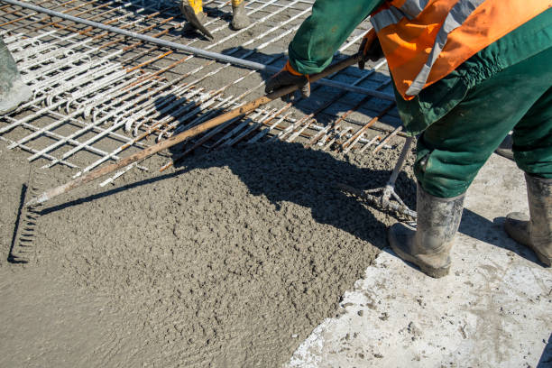 Concrete pouring on the construction site stock photo