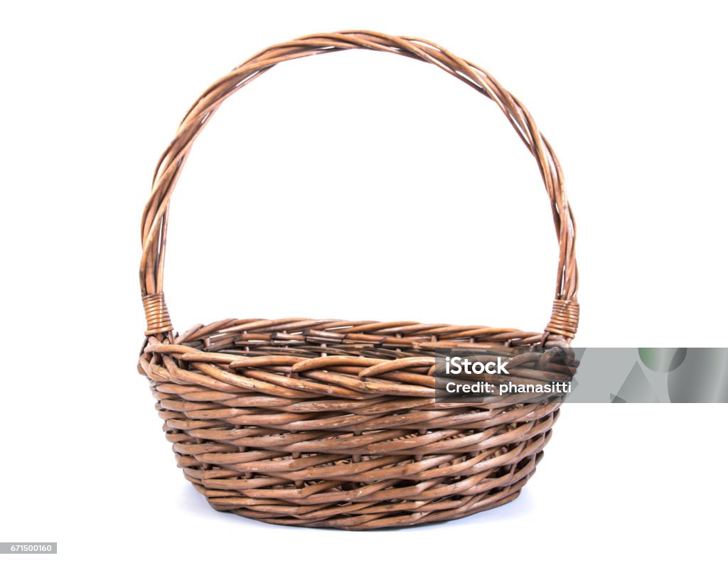 Wicker rattan basket isolated on white background.Old rattan basket Basket Stock Photo