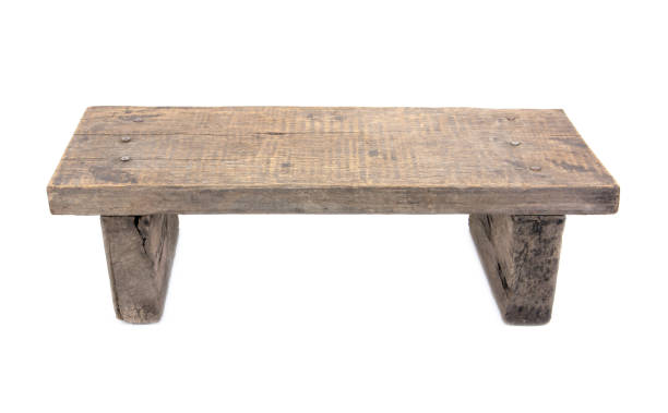 istock Wooden rustic bench isolated.Old wooden bench isolated on white background. 671500504