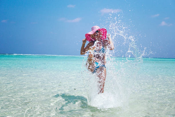 istock Blonde woman have fun on Maldives 671504300
