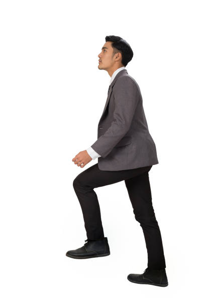 istock Ambitions concept with businessman climbing stairs 671504470