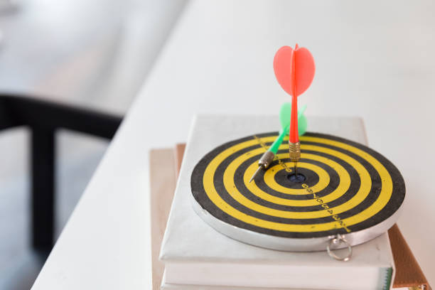 istock darts arrows hit the target center 671504548