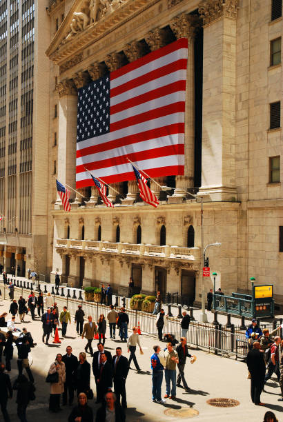 New York Stock Exchange New York, NY, USA April 16, 2009 A Lunchtime Crowd in Front of the New York Stock Exchange on Wall Street lower manhattan photos stock pictures, royalty-free photos & images