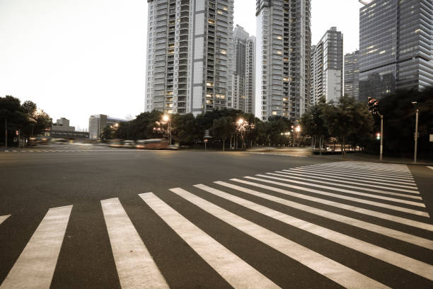 istock Empty road surface with city landmark buildings of evening 671514510