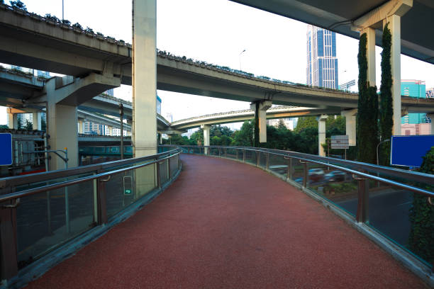 istock Empty road surface floor with City road overpass viaduct bridge 671514812