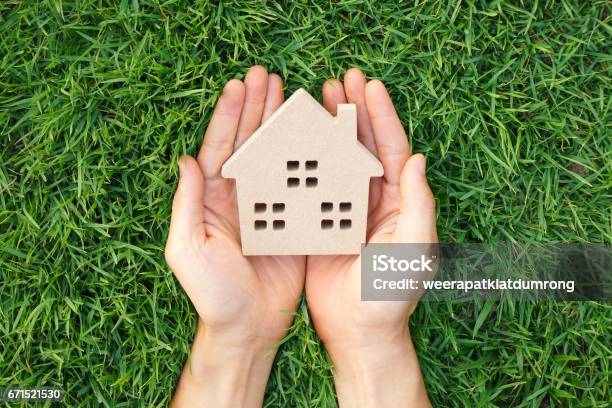 Eco House And Green Living Concept Stock Photo - Download Image Now - Energy Efficient, Domestic Life, Residential Building