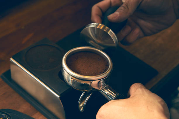 istock Coffee powder in espresso scoop 671521570