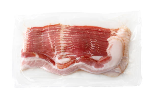 Bacon Package With Path On White Background Package of bacon wrapped in plastic on white background with vector clipping path. vacuum packed stock pictures, royalty-free photos & images