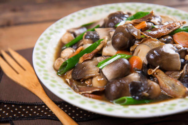 istock Sauteed mushroom with onion on the table 671539834