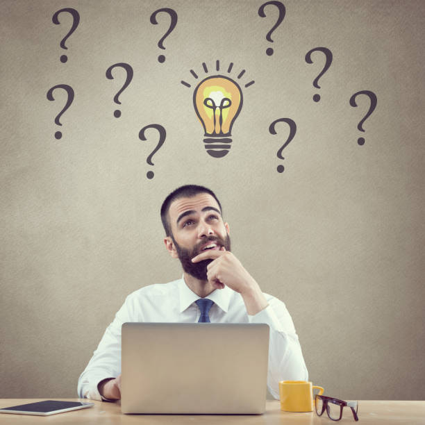 istock Confused businessman working on laptop 671547062
