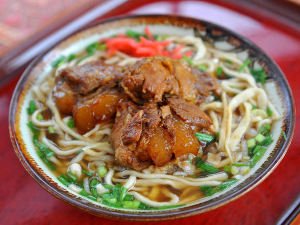 istock Ramen udon noodle with sauteed beef in bowl 671556648