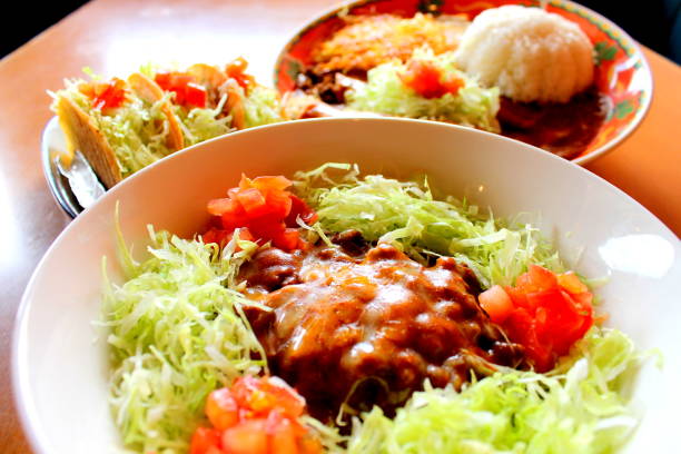 istock Bean soup with vegetables in bowl 671560276