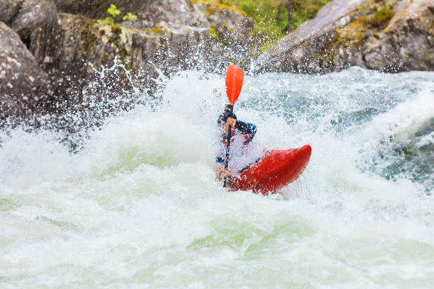 istock Extreme white water mountain canoeing 671560492