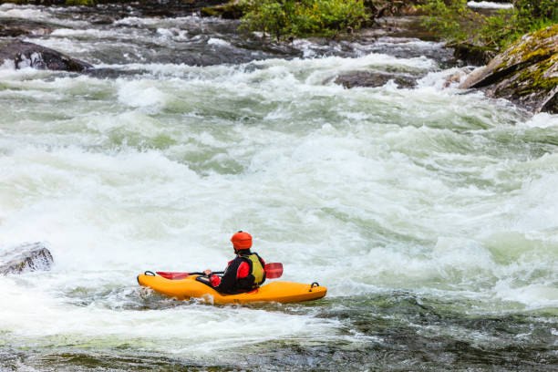istock Extreme white water mountain canoeing 671560634