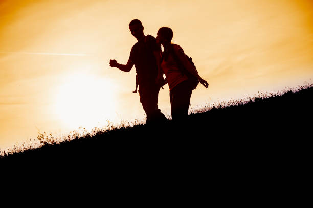 istock Couple hiking in the beautiful mountains 671565042