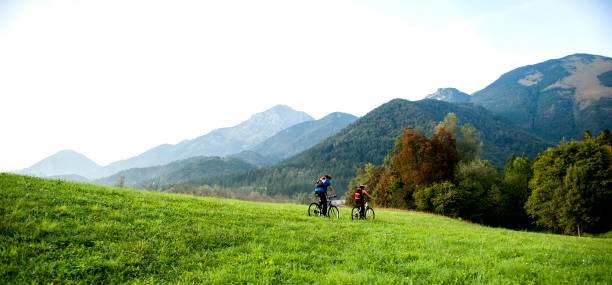 istock Happy couple on bicycles 671565252