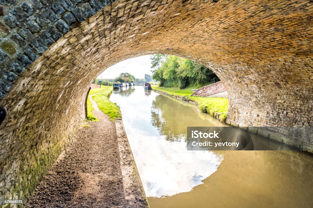 Morning view bridge over canal England United Kingdom Morning view bridge over canal England United Kingdom. Bridge - Built Structure Stock Photo