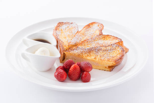 istock Grilled bread in heart shape with strawberry and cream 671570886
