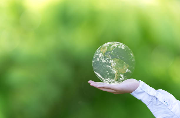 istock Holding a glowing earth globe in his hands. Earth image provided by Nasa. 671571304