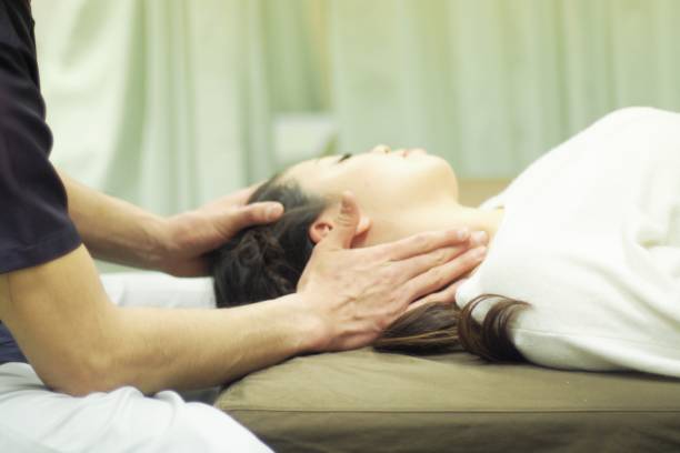 istock Woman receiving massage on neck 671578590