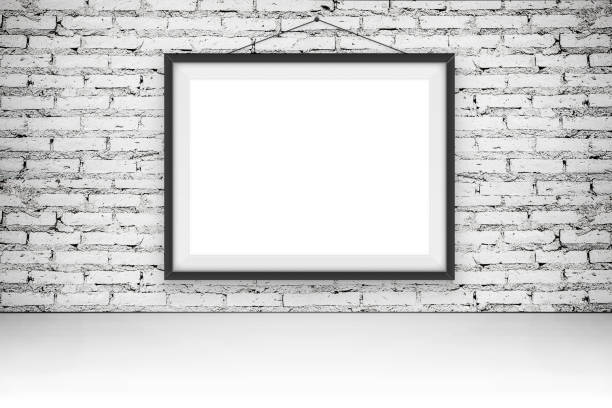 istock Blank picture frames on the wall for mock up 671579380