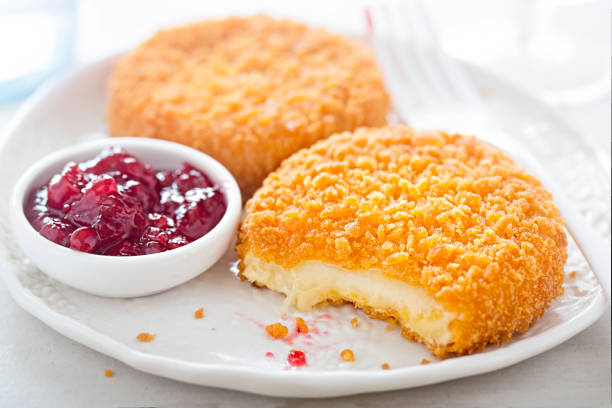 Fried camembert with cranberry sauce stock photo